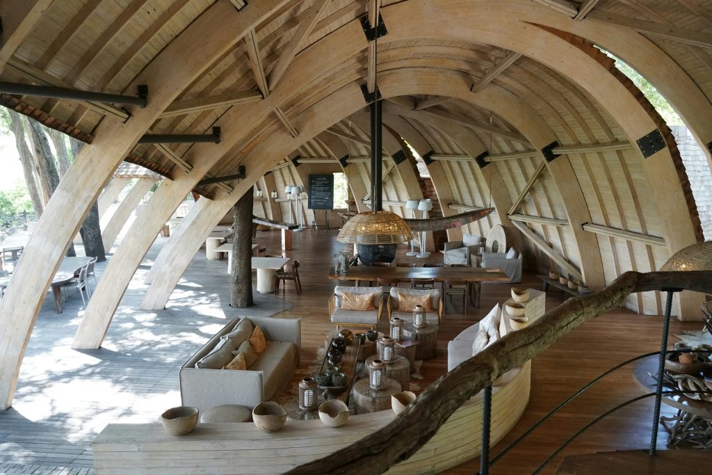 Warm timber safari lodge dining room